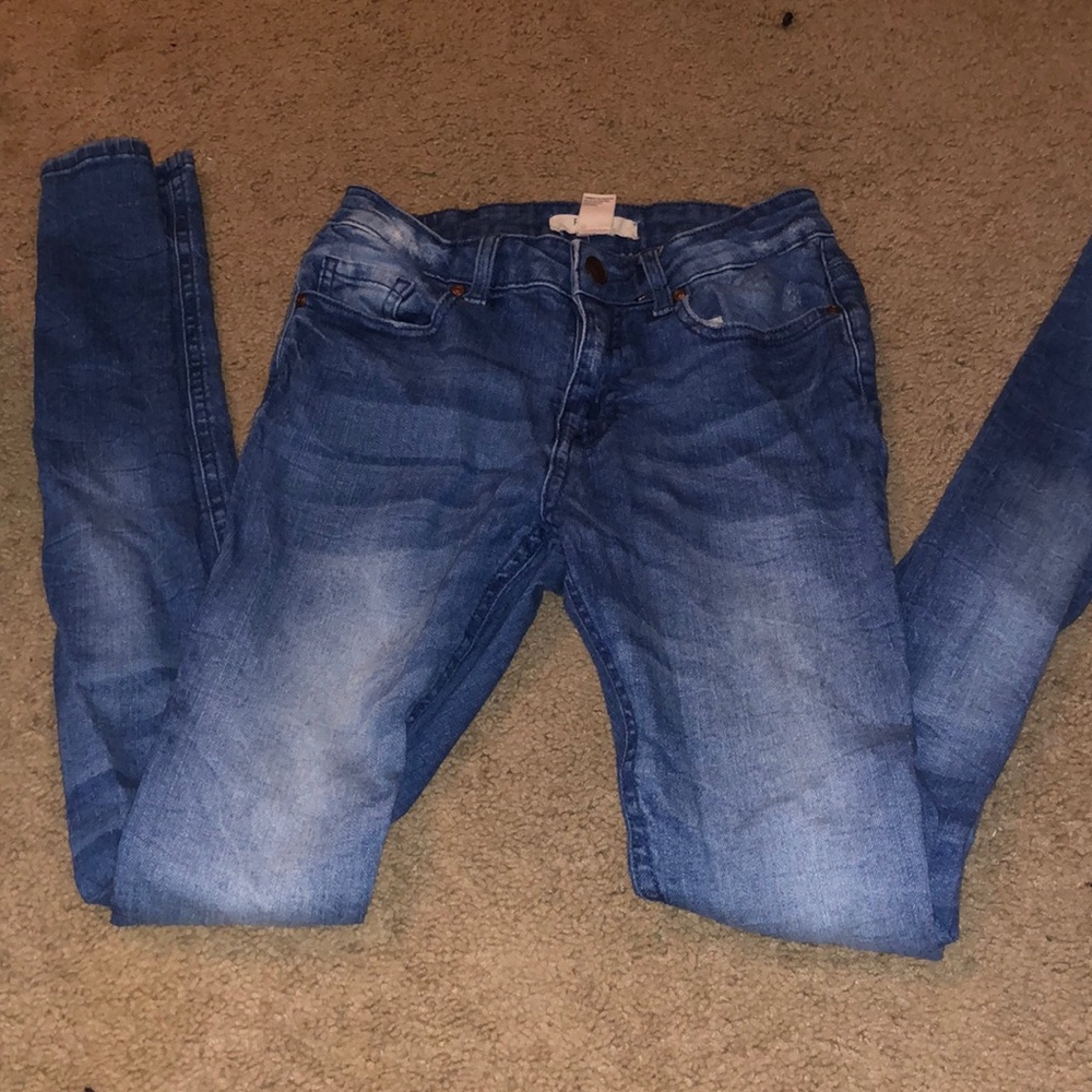 Jeans Worn a few times. No holes are problems with them. Skinny legged.